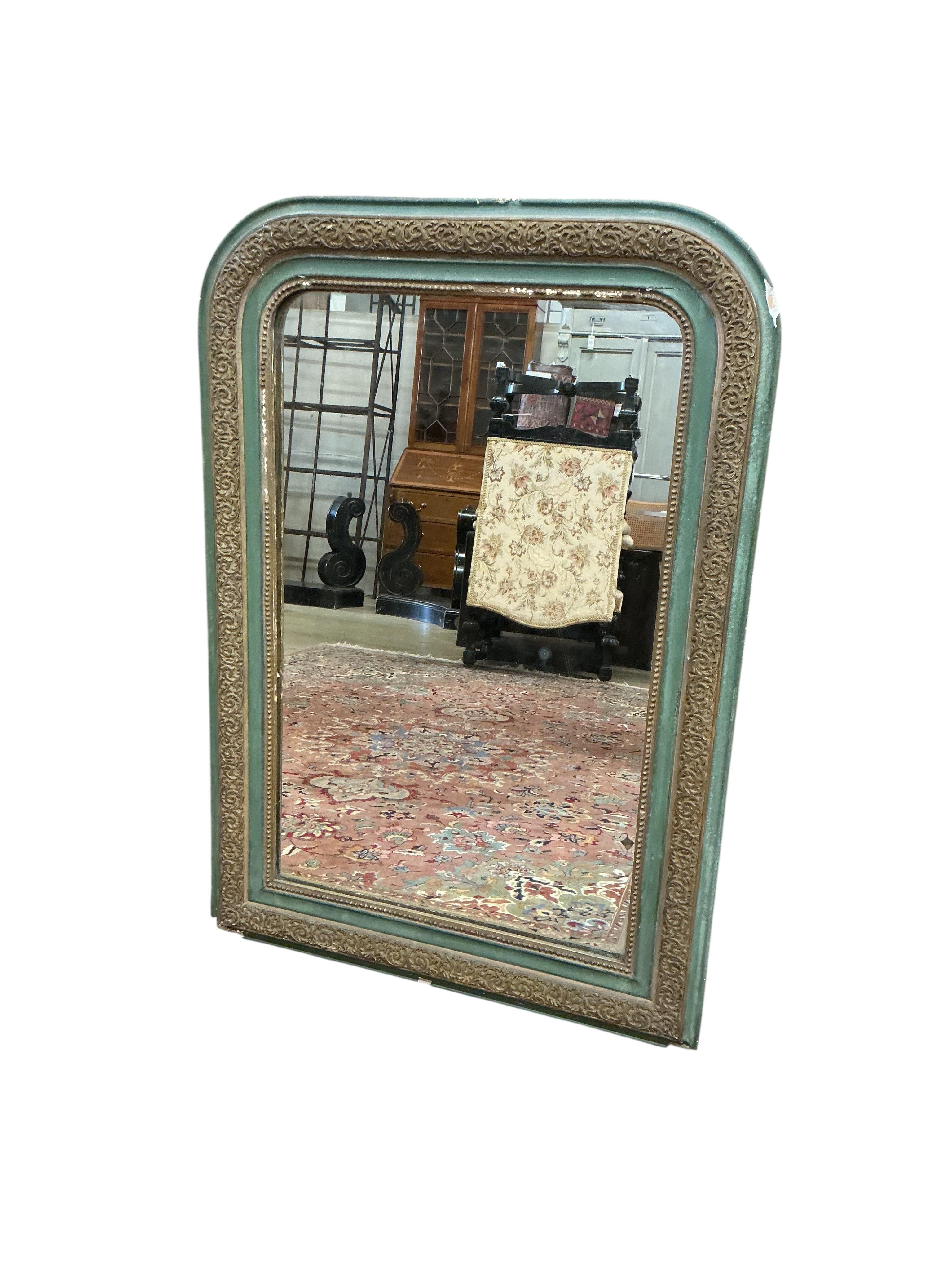A 19th century wood and composition gilt overmantle mirror, later painted. Width 73cm, height 104cm.